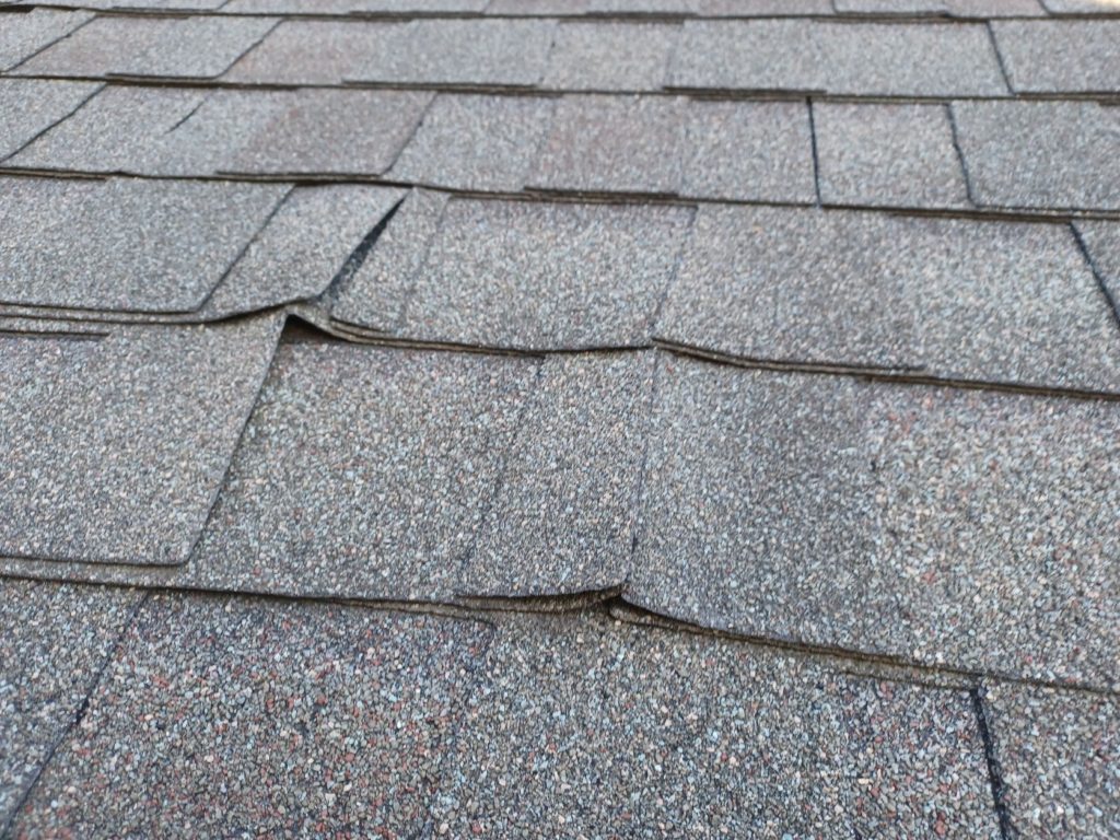 Inspect Roof For Damage, Loose, or Missing Shingles and Repair if needed - Best Fall Home Maintenance Checklist - The Daily DIY