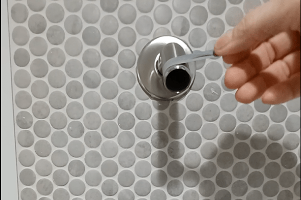 How To Quickly Change Your Shower Head - The Daily DIY