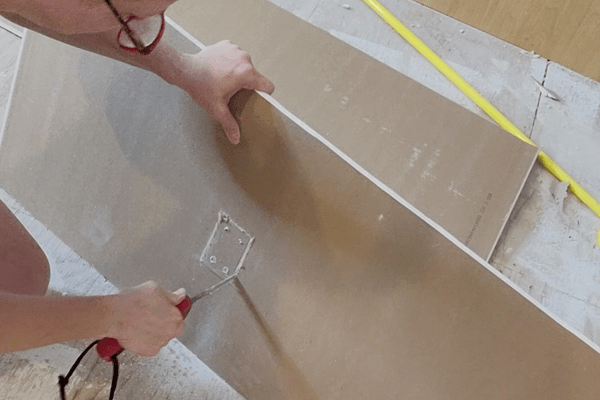 How To Cut a Hole In Drywall - The Daily DIY