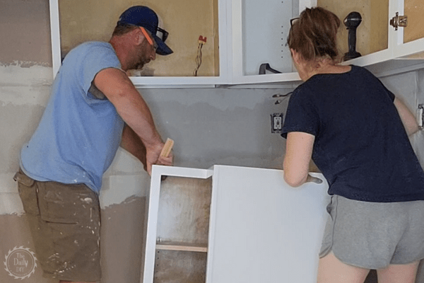 Installing Base Cabinets - The Daily DIY