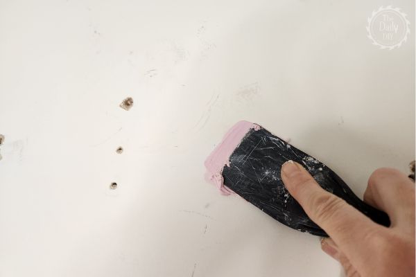 how to fill in holes in wall