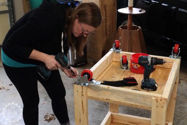 Portable miter saw cart on wheels