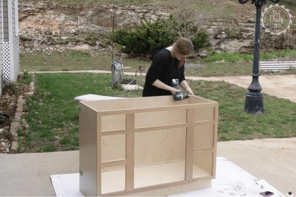 Woman assembling an RTA cabinets